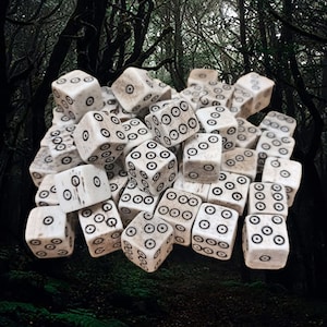 Medium Bone Dice With Black Dot and Rings Marks