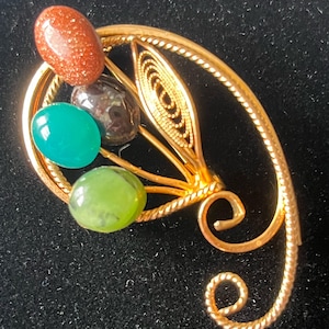 Vintage Filigree Gold Tone Metallic Swirl Brooch with Semi-Precious Stones