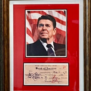 Ronald Reagan Autograph - A Handwritten 1948 Personal Check with A Striking Photo of the Former President
