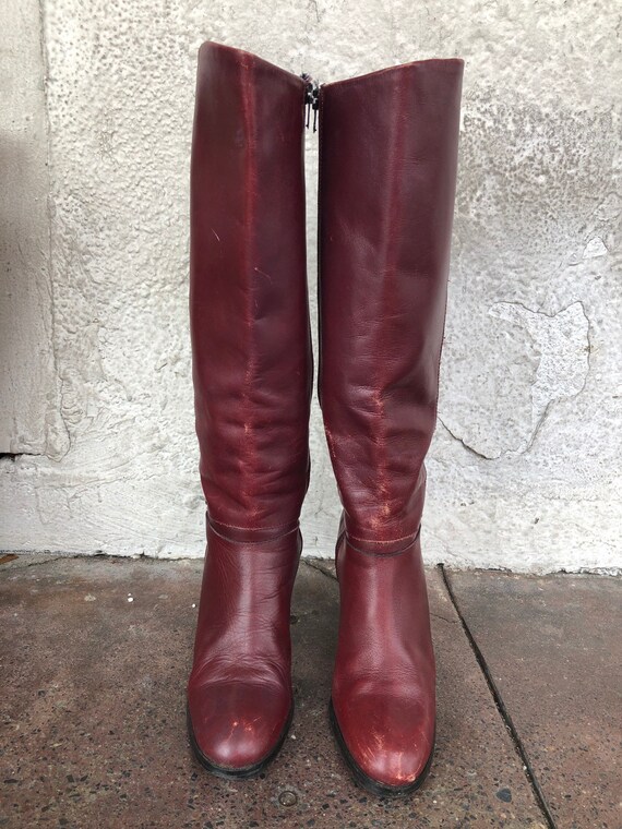 burgundy high knee boots
