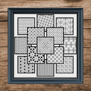 May include: Black and white geometric pattern design in a framed artwork. The design is made up of repeating squares and rectangles with different patterns.