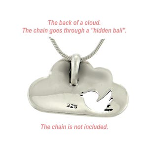 May include: Silver cloud pendant with a bird cut-out. The back of the pendant has the inscription "925". The chain is not included.
