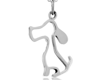 May include: A silver necklace with a simple outline of a dog pendant.