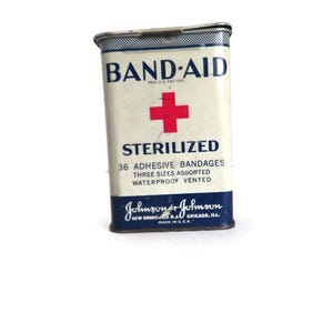 Vintage Johnson & Johnson Band-Aid Collectible Metal Tin Old Authentic White and Blue Band Aid Container with Red Cross Symbol  Hinged Lid
