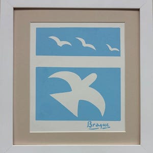 May include: A blue and white print of a bird in flight, with a signature by the artist, "Braque", in the bottom right corner.