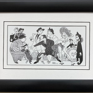 May include: Black and white caricature drawing of a group of people, including a man in a pinstripe suit, a woman in a dress and hat, and a man playing a drum. The drawing is framed and has a white mat.