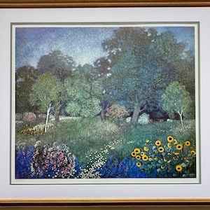 May include: A framed print of a landscape painting depicting a lush green meadow with a variety of wildflowers, including sunflowers, bluebells, and daisies. The meadow is surrounded by a forest of trees, including a large oak tree in the center of the image. The sky is a soft blue with a few clouds.