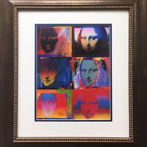 May include: A framed print of a pop art style image of the Mona Lisa. The image is divided into six squares, each with a different color scheme and a slightly different version of the Mona Lisa's face.