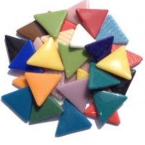 May include: A collection of colorful, triangular mosaic tiles in various shades including green, yellow, orange, blue, and red. The tiles are arranged in a pile, showcasing their glossy surfaces and geometric shapes.