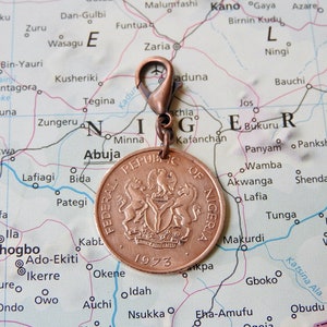 Nigeria coin charm - made of a genuine coin - Nigeria gift - travel charm - wanderlust gift - travel charm bracelet - national emblem