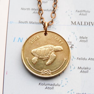 Maldives coin necklace/keychain - 5 different designs - Logger head sea turtle - Pacific Triton sea shell - palm tree - Mosque and minaret