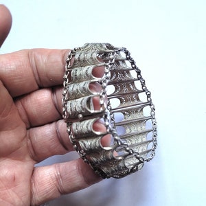 Flexible filigree ottoman bracelet in silver opening clips