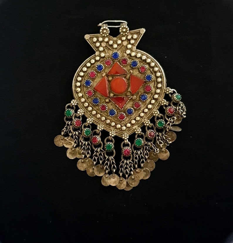 Turkmen silver pendant and glassware with pendants