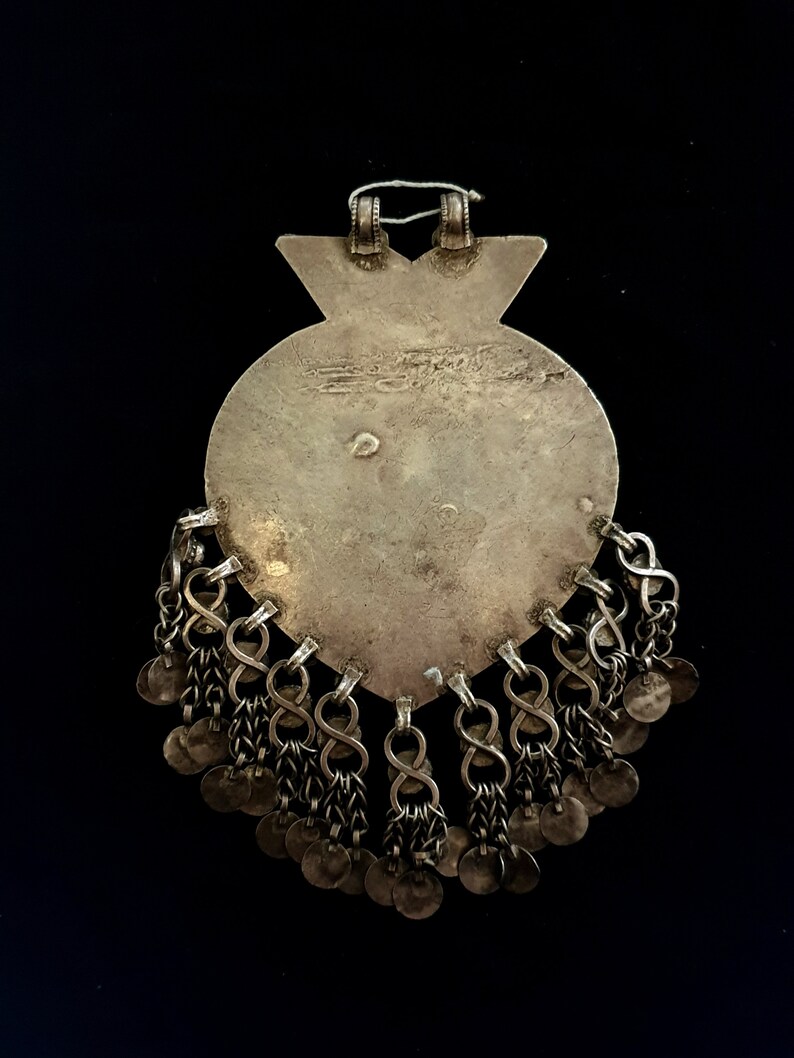 Turkmen silver pendant and glassware with pendants