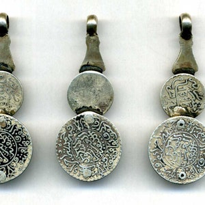 Morocco 5 Old Silver Pendants with ancient coins held by a hand of fatima image 2