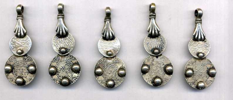 Morocco 5 Old Silver Pendants with ancient coins held by a hand of fatima image 1