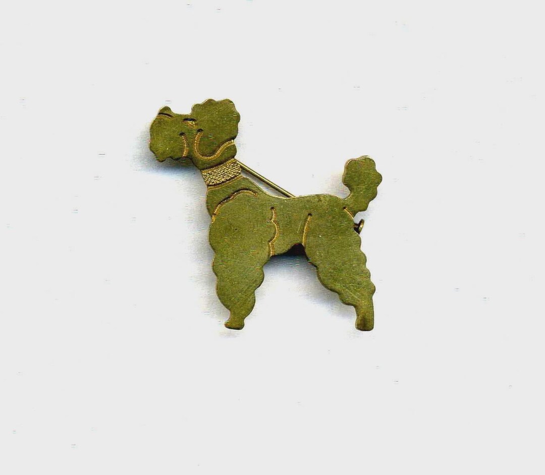 プードルを象った金メッキの金属ブローチ - Etsy 日本