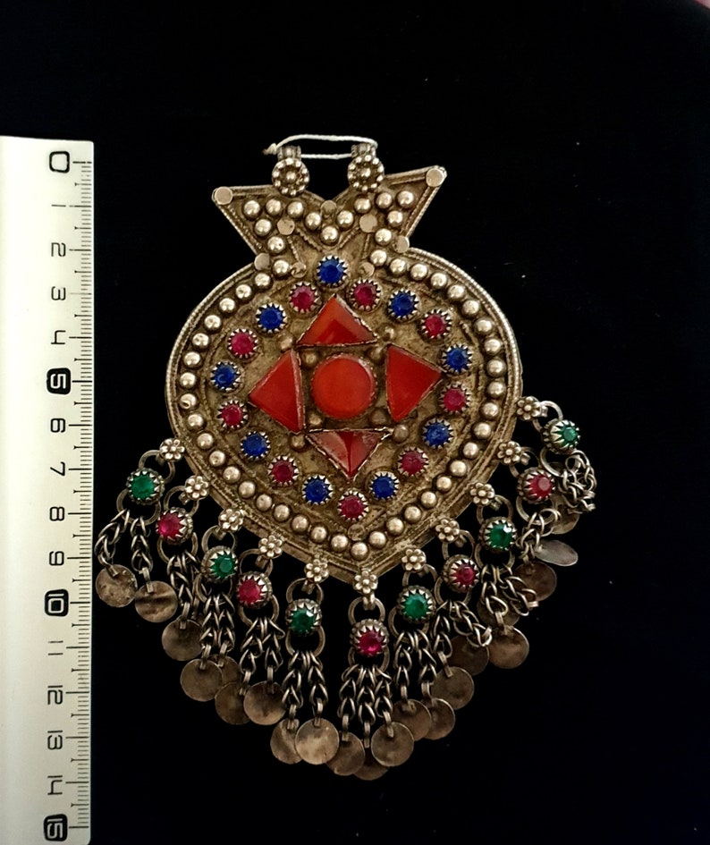 Turkmen silver pendant and glassware with pendants