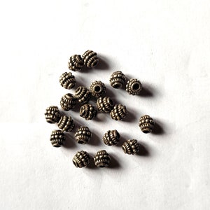 Lot of 20 old silver tribal beads for necklace