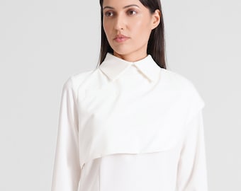 Elegante weiße Cape-Bluse mit langen Ärmeln, formelles Hemd, schickes Business-Casual-Outfit, avantgardistische Kleidung, modernes Büro-Outfit für Damen, Arbeitsbluse