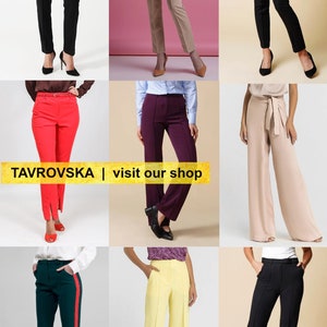 Pantalones de trabajo negros de cintura alta y pierna acampanada. imagen 9