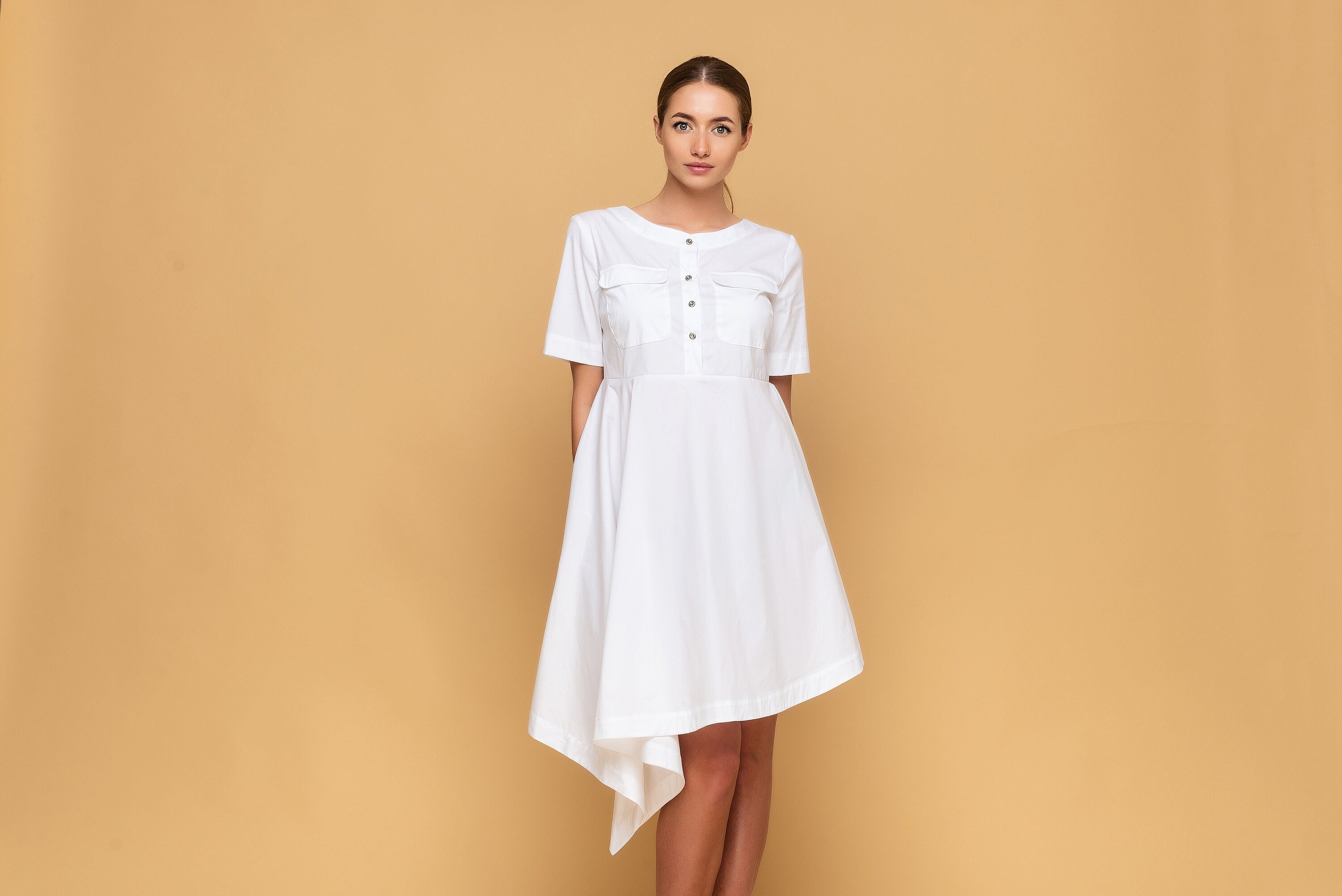 Double button high low peplum top sale
