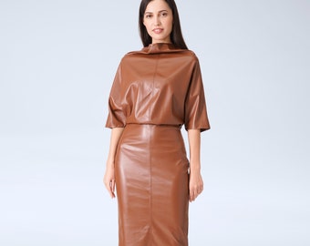 May include: A brown leather dress with a high neckline and a fitted silhouette. The dress has a slightly flared skirt and short sleeves.