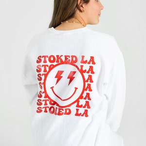 Red lightning smiley Crewneck