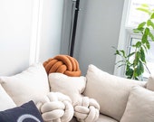 Light Cream Knot Pillow: Modern Scandinavian Decor — image 4