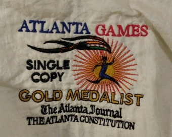 Bandeiras corta-vento Vtg 1996 Atlanta Games, cópia única, medalha de ouro, tamanho XL