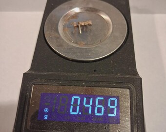 Pino de gravata JRN inicial 14K 0,469 Gr.