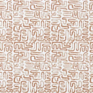May include: A fabric with a repeating pattern of abstract, brown, squiggly lines on a white background. The fabric is labeled "Angela Harris - Minos Clay Luxe Canvas". The design is reminiscent of ancient symbols.