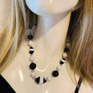 Black and white abstract design beaded necklace.