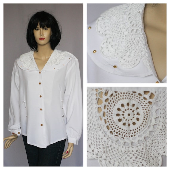 white blouse with gold accents