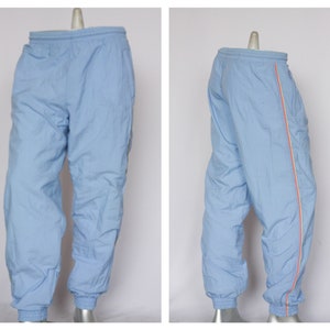 Niebieskie spodnie dresowe Męskie spodnie dresowe Spodnie sportowe Spodnie sportowe Męskie spodnie sportowe Spodnie z lat 90. Spodnie unisex Spodnie vintage Odzież sportowa Średni