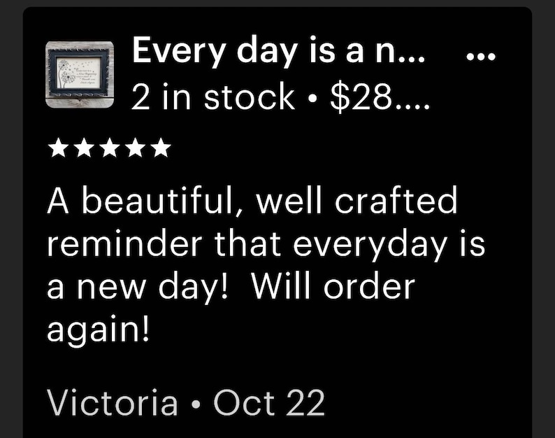 May include: A black and white framed print with the text "Every day is a new day!"  The print is on a black background with white text. The frame is made of wood and has a distressed finish. The print is 2 inches in stock and costs $28.