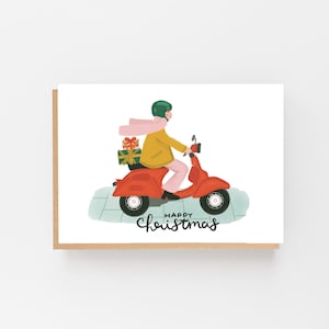 Joyeux Noël fille sur cyclomoteur avec cadeaux - carte de Noël - carte de charité