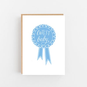 Bébé garçon « Bébé plus mignon » bleu carte de Rosette