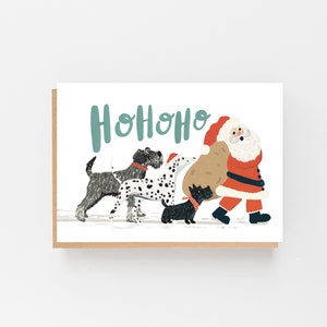 Cartão De Natal Cães seguindo Santa Ho Ho Ho