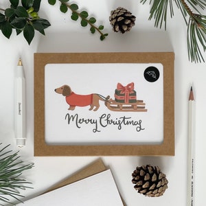 Tarjetas navideñas con Dachshund y trineo - paquete de 6 tarjetas - Juego de 6 tarjetas navideñas ilustradas - Tarjetas benéficas - Respetuosas con el medio ambiente