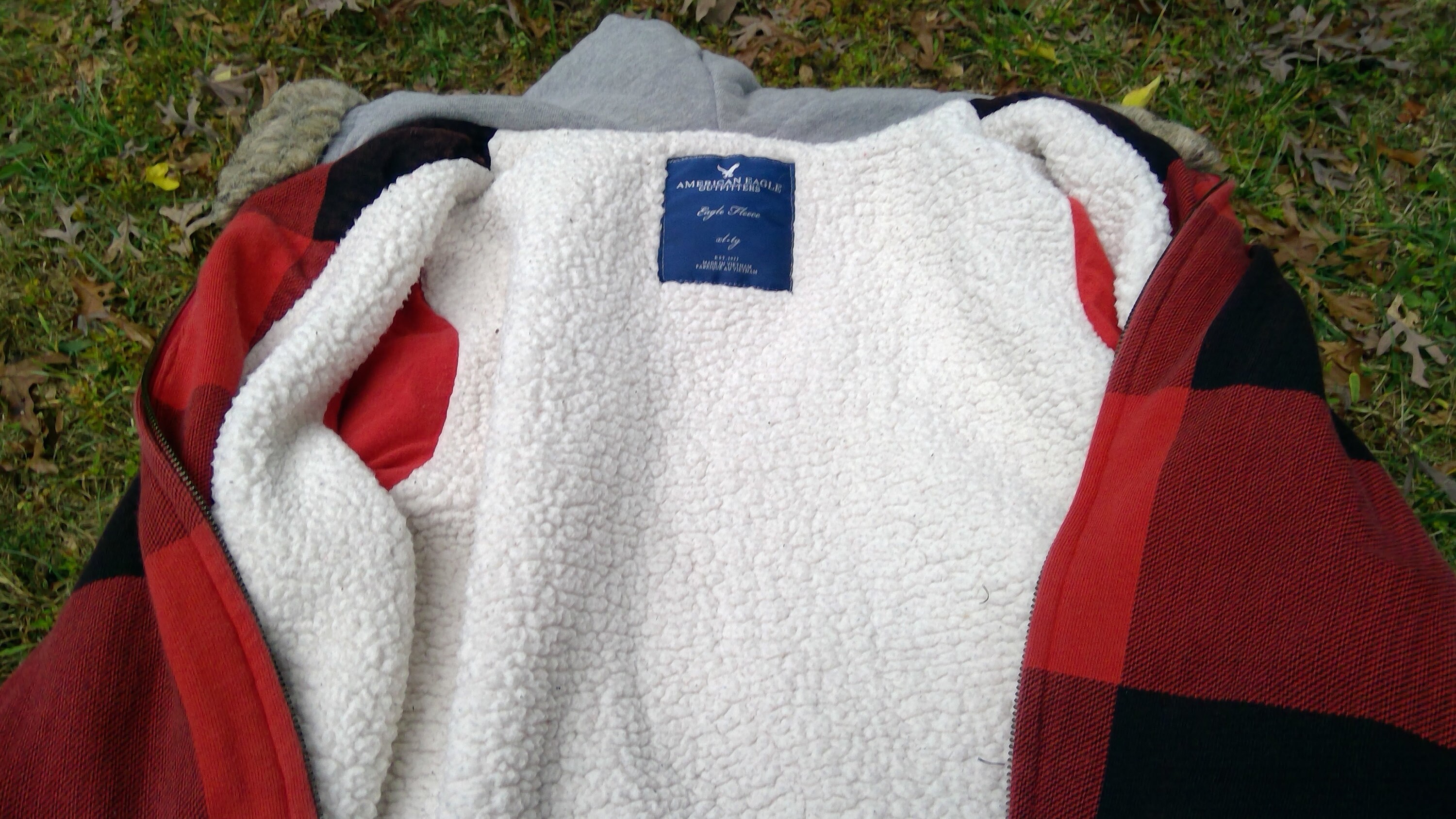 red and black plaid sherpa pullover