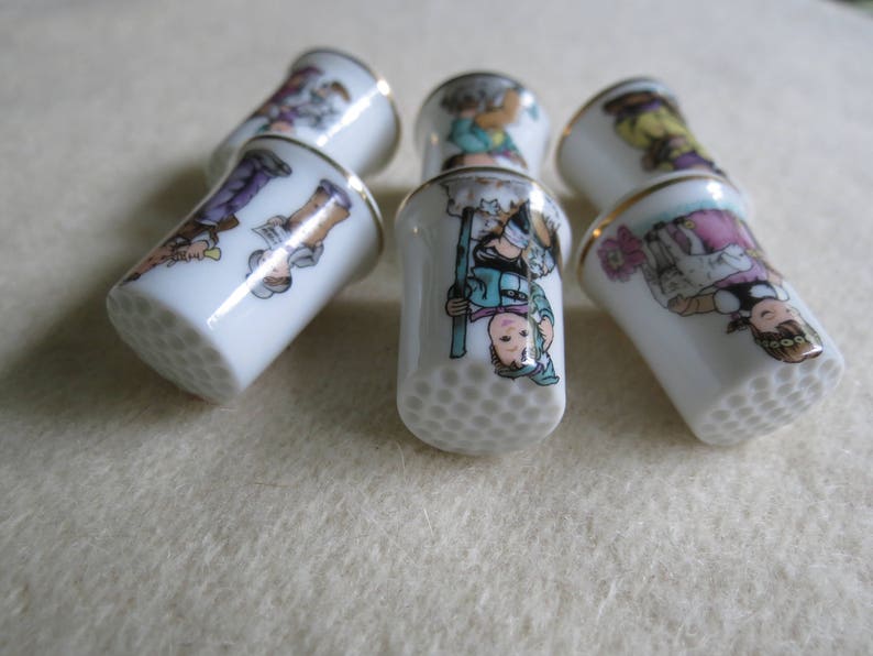 Charming Norman Rockwell Children Sewing Thimble Set of 6 Porcelain Thimbles