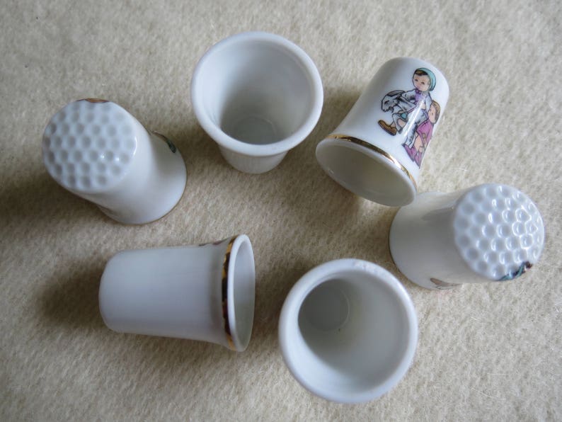 Charming Norman Rockwell Children Sewing Thimble Set of 6 Porcelain Thimbles