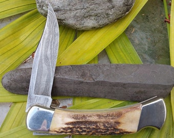 Buck 110 Damascus Blade Knife - Beautiful Stag Handles Buck 110 Damascus Blade Knife - Beautiful Stag Handles