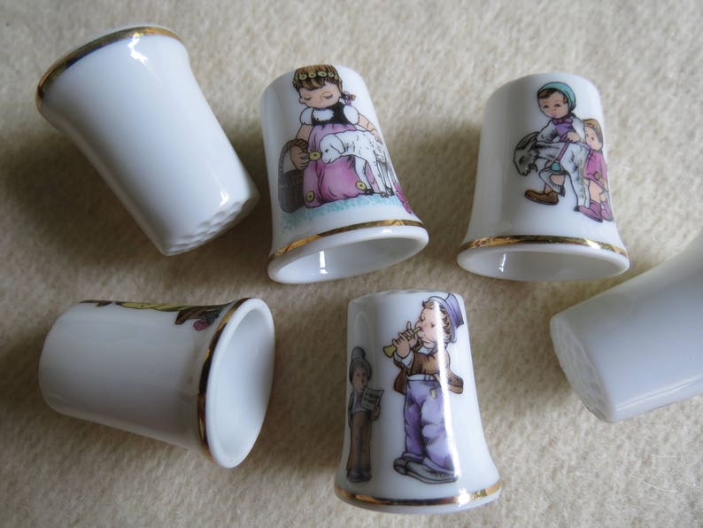 Charming Norman Rockwell Children Sewing Thimble Set of 6 Porcelain Thimbles