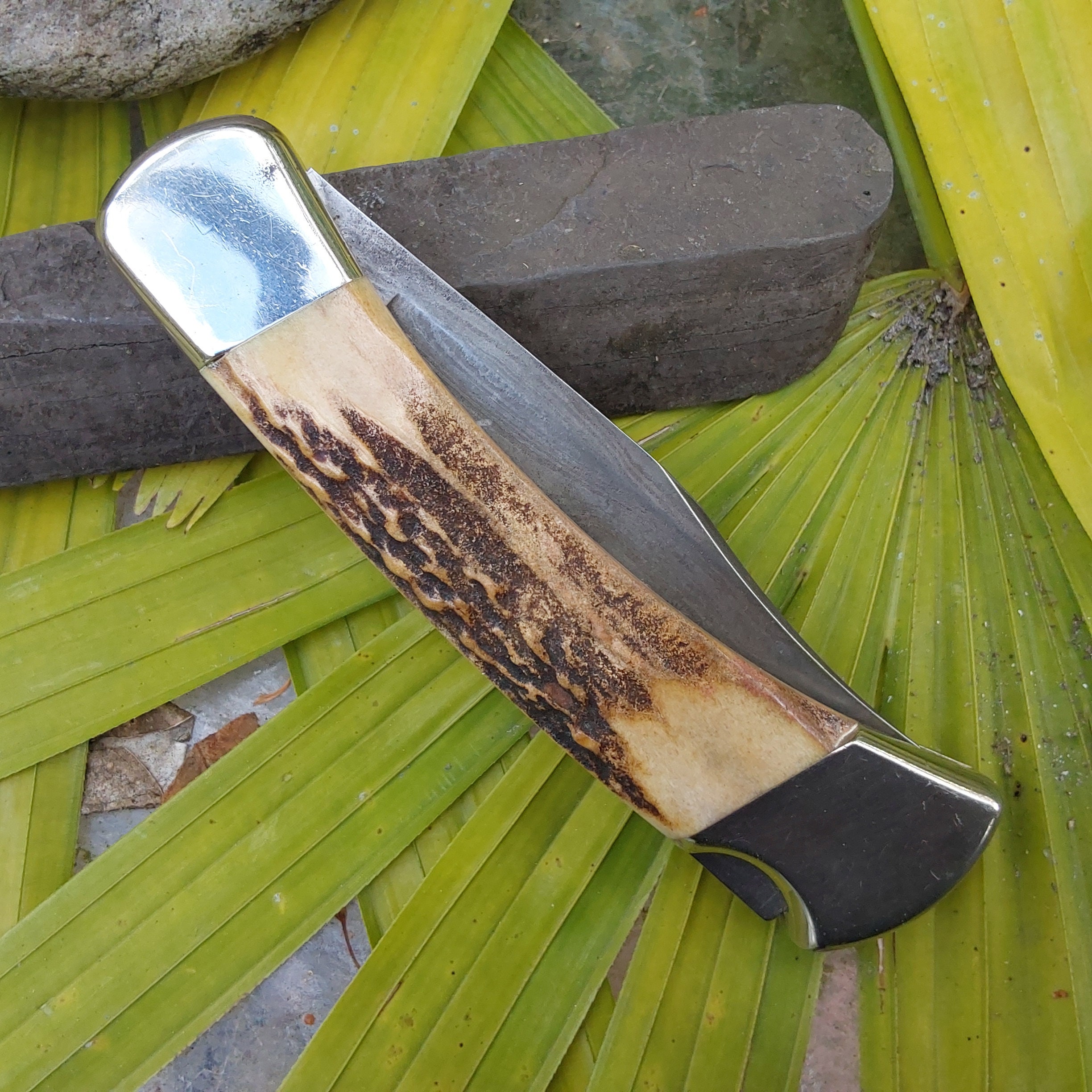 Buck 110 Damascus Blade Knife - Beautiful Stag Handles Buck 110 Damascus Blade Knife - Beautiful Stag Handles
