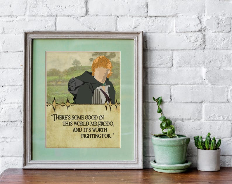May include: A framed print with a quote from the Lord of the Rings. The quote reads "There's some good in this world Mr Frodo, and it's worth fighting for..." The print features a cartoon illustration of a red-haired character with a green background.