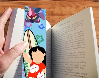 May include: A colorful bookmark featuring a cartoon character from the Disney movie Lilo & Stitch. The character is holding a surfboard with a floral design. The background is blue with white and pink flowers. The bookmark is made of durable plastic and is perfect for marking your place in a book.
