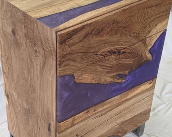 Custom small chest of drawers featuring  epoxy river, 4 touch open drawers and a custom made metal base frame. Made w/ reclaimed PNW oak.