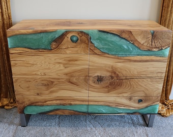 Custom made epoxy river dresser featuring 8 soft touch open drawers and a custom made metal base frame. Made w/ reclaimed PNW oak